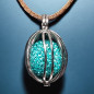 Pendentif Boule Strass bleu en cage sur cordon réglable