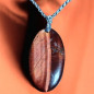 Pendentif Œil de taureau sur chaîne acier inox