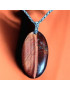 Pendentif Œil de taureau sur chaîne acier inox