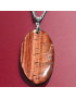 Pendentif Œil de taureau sur chaîne acier inox