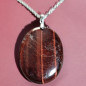 Pendentif Œil de taureau sur chaîne acier inox