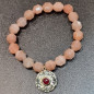 Bracelet Pierre de lune rose facettée & Rubis sur disque plaqué or