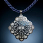 Pendentif Mandala acier inox sur cordon